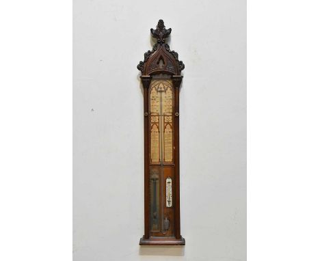 A Victorian carved walnut Admiral Fitzroy barometer, length 126cm.