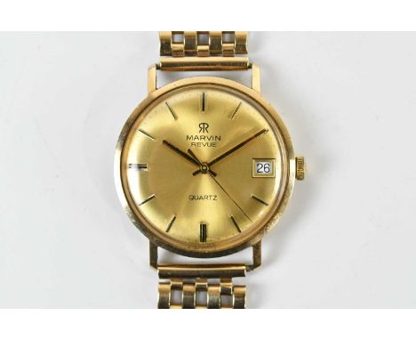 MARVIN; a gentleman's vintage 9ct gold 'Revue' quartz wristwatch, with date aperture and baton markers to the circular dial, 