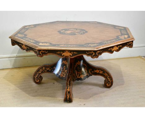 A 19th century marquetry inlaid walnut octagonal centre table, inlaid with floral sprays, table globe, instruments, farm tool