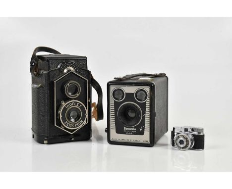 Three cameras, including a Zeiss Ikon Ikoflex TLR camera, with a 8cm f6.3 lens, a Kodak Brownie Model C and a Mycro III A sub