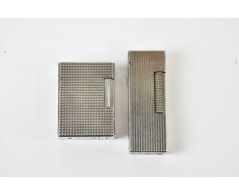 DUPONT; a silver plated textured rectangular lighter and a similar Dunhill example (2).