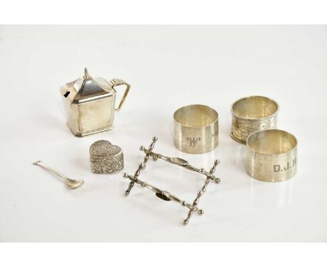 DEAKIN &amp; FRANCIS; a George VI hallmarked silver Art Deco mustard, Birmingham 1938, three hallmarked silver napkin rings, 