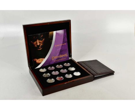THE LORD OF THE RINGS; a collection of official New Zealand coins of the motion picture trilogy struck in sterling silver, ea
