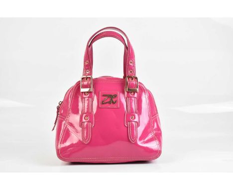 ZANDRA RHODES; a fuchsia pink leather handbag, trimmed in light pink stitching with top handles, rose gold tone hardware, wit