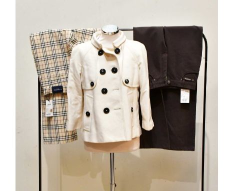 BURBERRY; a cream short wool double-breasted jacket, with large black button detail, small collar and front pockets, size UK 