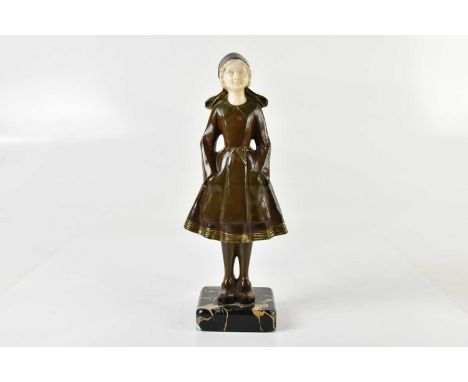 X JOSEPH D'ASTE (1881-1945); an early 20th century bronze and ivory figure of a Dutch girl, signed, inscribed 'Etling, Paris'