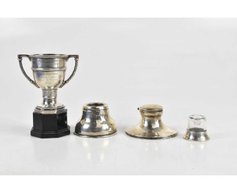 WALKER &amp; HALL; a George VI hallmarked silver twin handled pedestal trophy cup, on octagonal plinth base, Sheffield 1940, 
