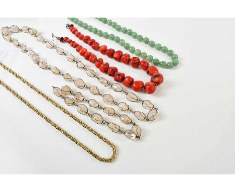 A hand tied polished jade bead set necklace, with clasp stamped 'Silver', length approx 56cm, and three further decorative ne