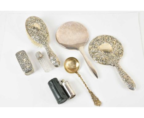 HENRY BUSHELL &amp; CO; an Elizabeth II hallmarked silver chandelier mirror and hair brush, stamped Birmingham 1960, with a D
