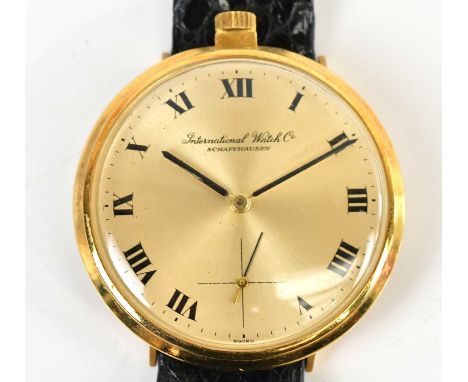 IWC (INTERNATIONAL WATCH COMPANY); a gentleman's 18ct yellow gold wristwatch of unusual proportions, with winding crown above