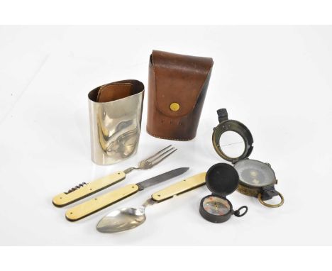 A set of folding cutlery comprising knife, fork and spoon, with leather carry case, a military compass and further compass (3