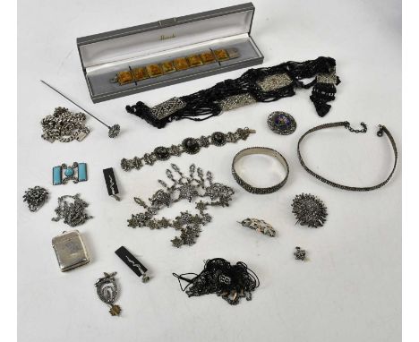 A group of costume jewellery including Mexican silver chains, a vesta case, a 19th century button with enamel detail, and var