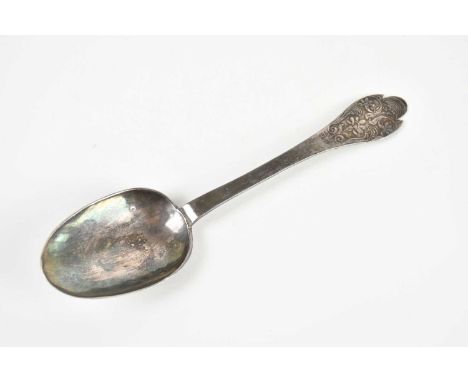 A 17th century provincial silver lace back rat tail dog nose trefid spoon, enscribed A.B W.N 1699, stamped with provincial ma
