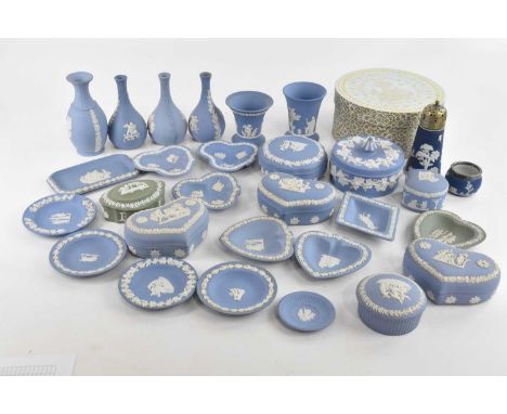 A collection of blue and white Wedgwood jasperware, including trinket boxes and vases, also a boxed 'Butterfly Bloom' collect