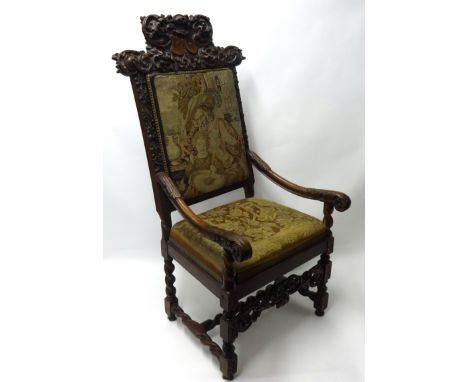 A 19th century carved walnut high back armchair with tapestry covers, 132cm high, Provenance; ROBERT LENKIEWICZ Studio Auctio