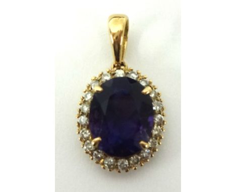 An amethyst and diamond pendant 