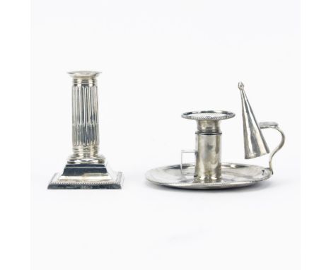 A Small Weighted English Silver Candlestick and a Continental Silver Telescoping Chamber Candle Holder. Both pieces with hall