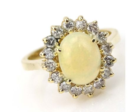 AIG Certified 1.18 Carat Opal Cabochon Cut Opal, .48 Carat Round Brilliant Cut Diamond and 14 Karat Yellow Gold Ring. Opal wi