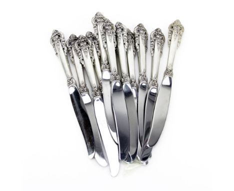 Lot of Twelve (12) Wallace Grande Baroque Sterling Silver Knives. Each with hollow handle and stainless blade. Marked Wallace