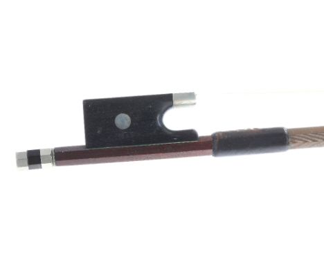 German nickel mounted violin bow by and stamped W. Seifert, the stick octagonal, the ebony frog inlaid with pearl eyes and th