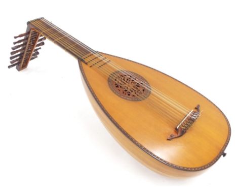 Vintage eight course lute, with multi-section maple bowl back, spruce top (restorations), gut fret fingerboard and decorative