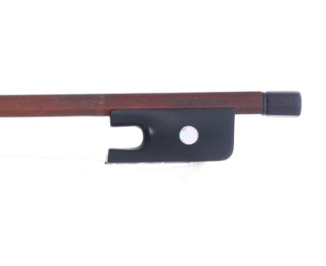 English violin bow stamped L. Panormo circa 1830, the stick octagonal, the ebony frog inlaid with pearl eyes and with an ebon