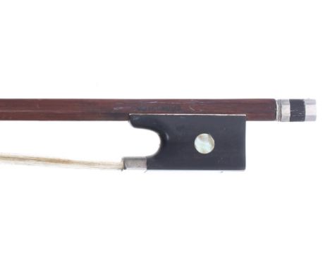 Silver mounted violin bow stamped Vuillaume, the stick round, the ebony frog inlaid with pearl eyes and the ebony adjuster wi