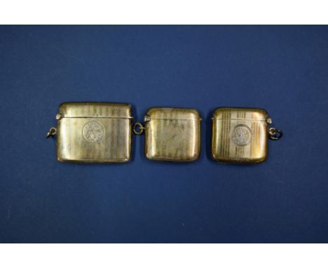 Three engine turned silver vesta cases.