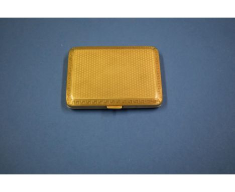 A 9ct gold engine turned cigarette case, 79g. 