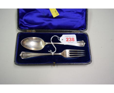 A cased silver christening fork and spoon, by Atkin Brothers, Sheffield 1912, 58g.