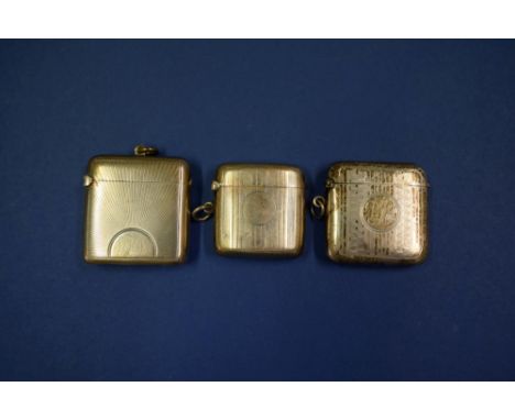 Three engine turned silver vesta cases.