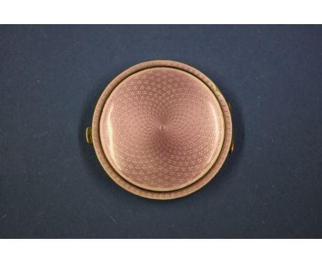 A silver gilt and pink guilloche enamel compact, by Crisford & Norris Ltd, Birmingham 1930.
