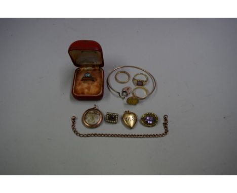 An 18ct gold blue topaz ring, by Bravingtons; together with a mauve enamel photo locket; three other Victorian items; and a q