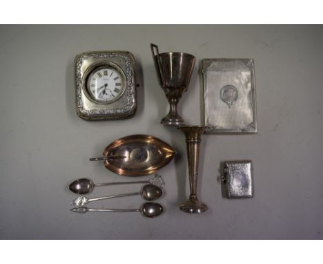 A Victorian engine turned silver calling card case; together with a silver vesta case; a silver mounted easel watch case and 