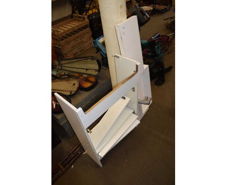 A modern bathroom basin and accompanying cabinet