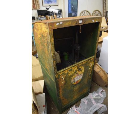 A vintage Red Line metal cased oil or fuel dispenser