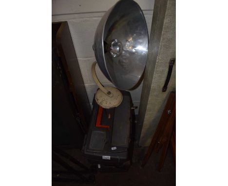 Two tool boxes containing tools and a retro lamp