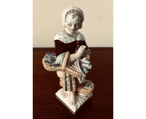 CERAMIC FIGURE- COME BUY MY FISH, APPROXIMATELY 11cm HIGH

 