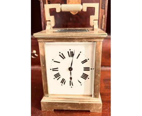 BRASS CASED CARRIAGE CLOCK WITH KEY

 