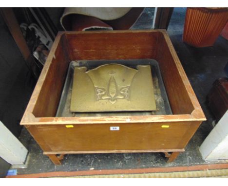 A mahogany floor standing planter