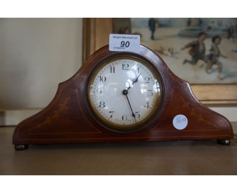 An Edwardian inlaid mahogany mantel clock.
