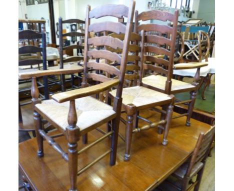 A set of six Lancashire ladder back rush seated chairs together with a similar smaller example.