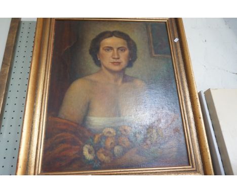 F.Kniely, oil on board depicting a portrait of a lady holding flowers, signed and dated 1957.