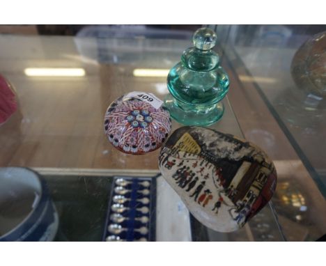 A Strathern glass paperweight having millefiore decoration together with a Victorian glass inkwell and a further stone paperw