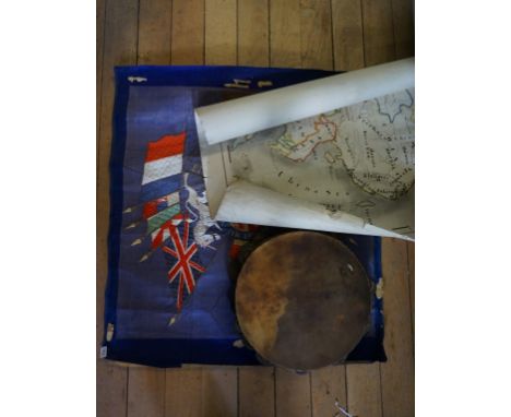 A mixed lot to include an embroidered coat of arms, hand highlighted map of India and China and a vintage tamborine.