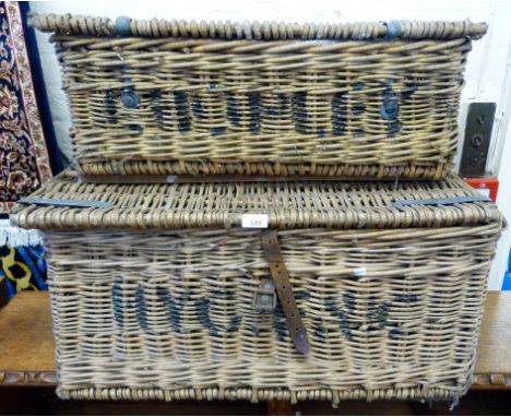 Two vintage wicker fishing baskets.