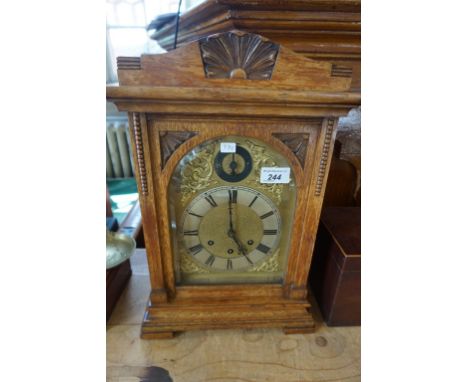 An early 20th Century light oak bracket clock.