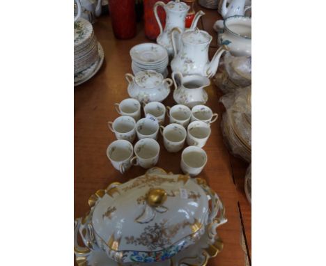 A French handpainted twin handled tureen and stand, also a Limoges part tea service.