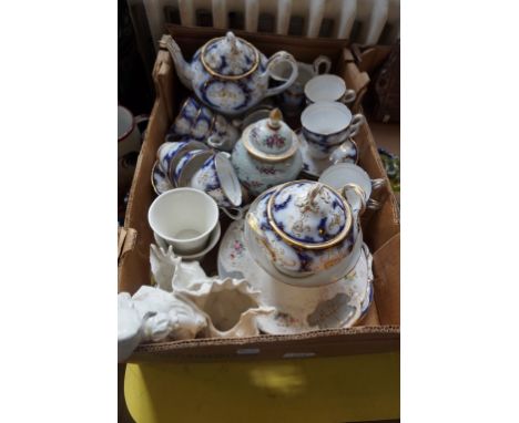 A 19th Century porcelain tea and dinner service, having gilt floral decoration, together with a Samson porcelain temple jar a