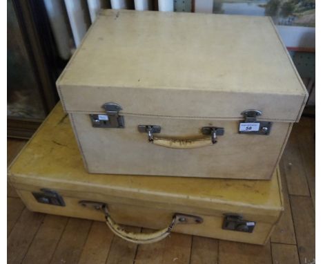 Two vintage pig skin travelling trunks.